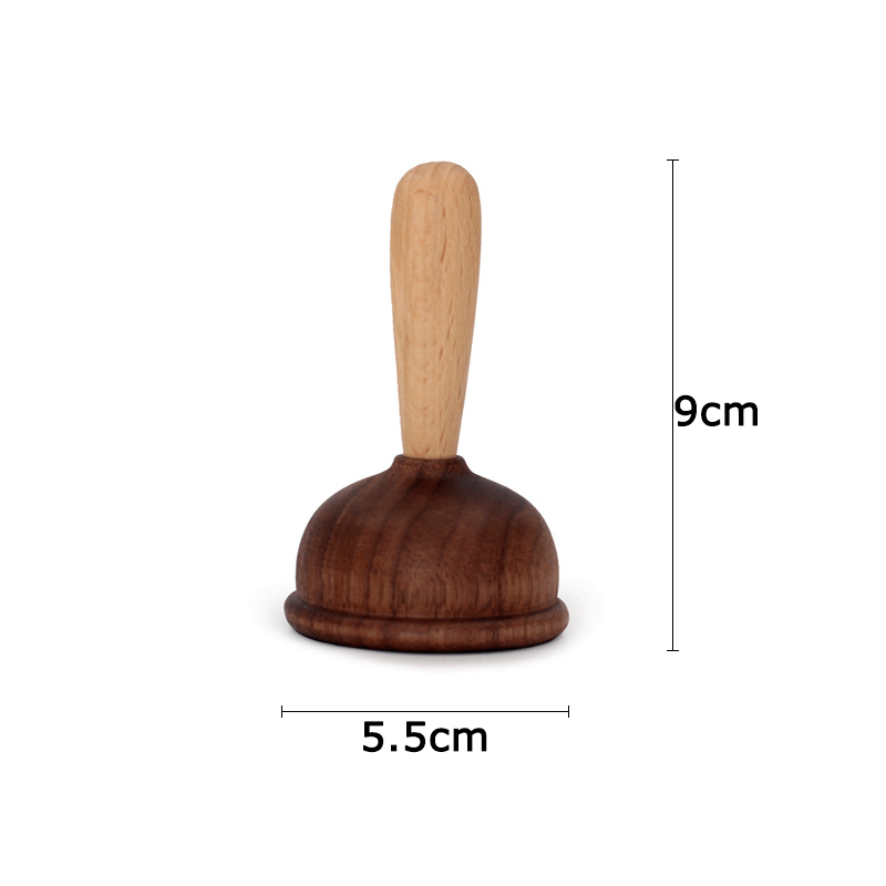 A bottle opener in the shape of a wooden toilet plug