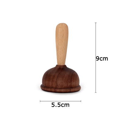 A bottle opener in the shape of a wooden toilet plug